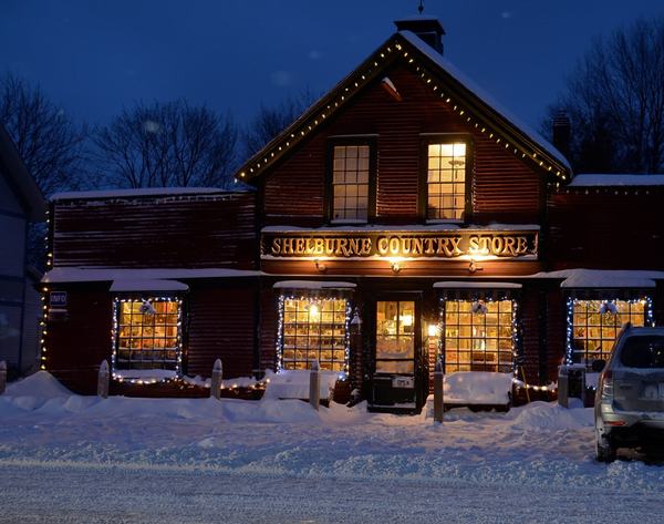 Shelburne Country Store lit for the season, in snow