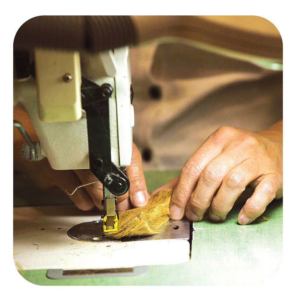A Vermont Teddy Bear stitched by hand at the Shelburne factory